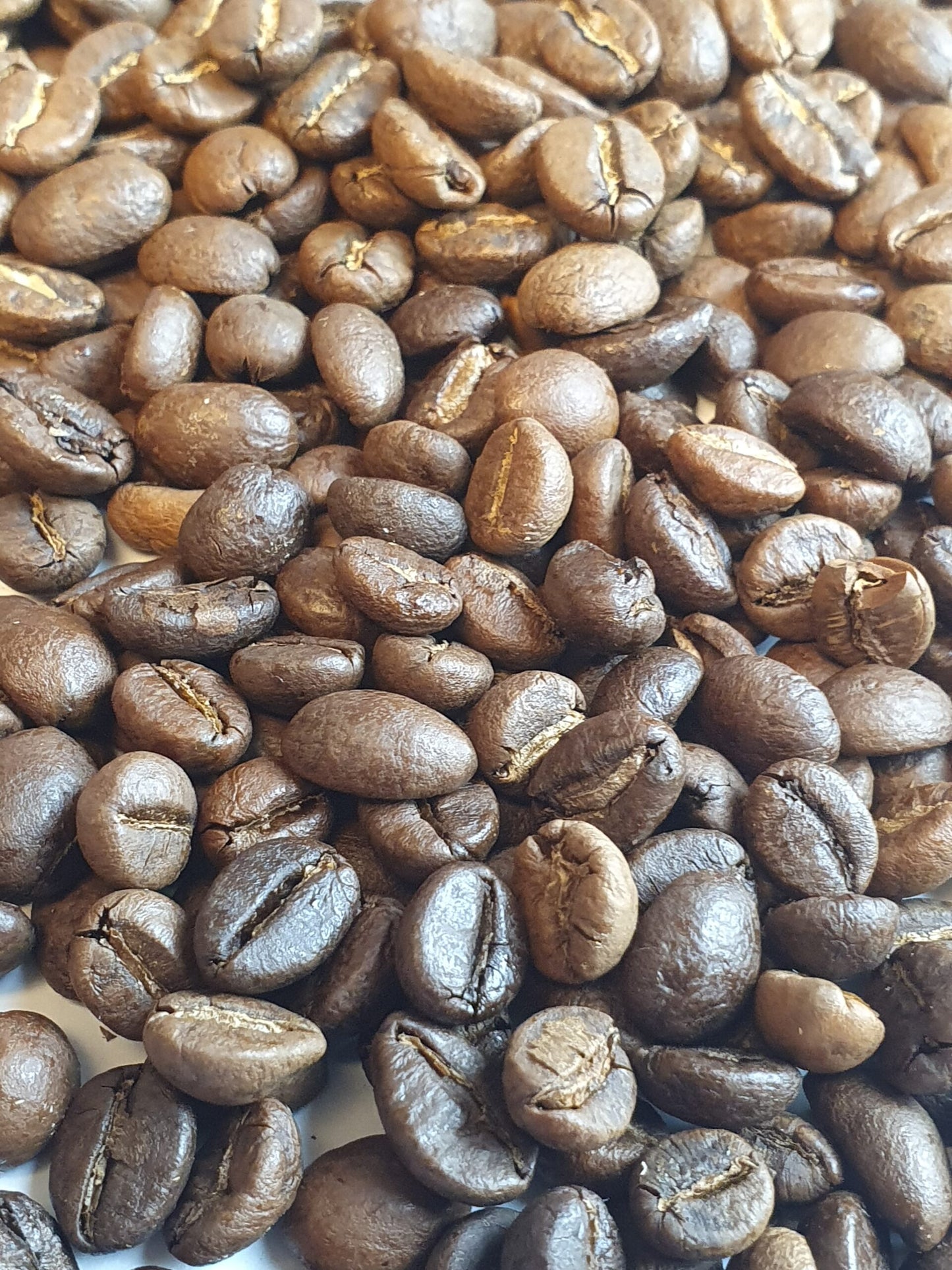 Bohnen, Espresso Peenetal, 70% Arabica,
30% Robusta, nussig-schokoladig, Goldmedaille